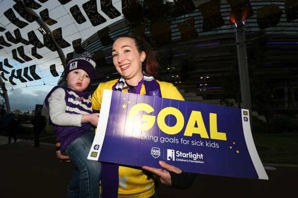 Fremantle fans support the Starlight Foundation during the 2021 AFL Round 18 match between the Fremantle Dockers and the Geelong Cats at Optus...