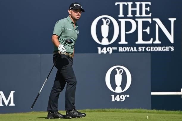 Golfer Brian Harman watches his drive from the 1st tee during his first round on day one of The 149th British Open Golf Championship at Royal St...