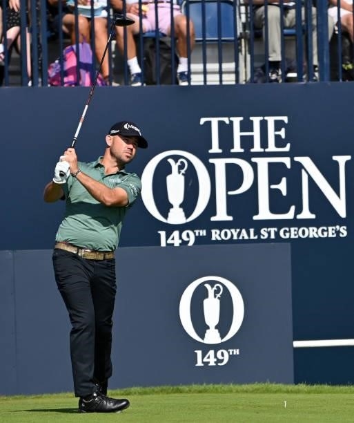 Golfer Brian Harman watches his drive from the 1st tee during his first round on day one of The 149th British Open Golf Championship at Royal St...