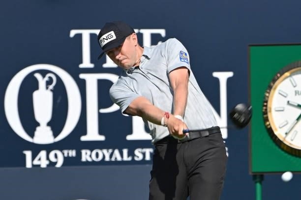 Canada's Mackenzie Hughes plays from the 1st tee during his first round on day one of The 149th British Open Golf Championship at Royal St George's,...