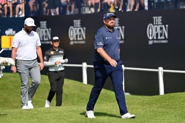 Ireland's Shane Lowry walks from the 1st tee during his first round on day one of The 149th British Open Golf Championship at Royal St George's,...
