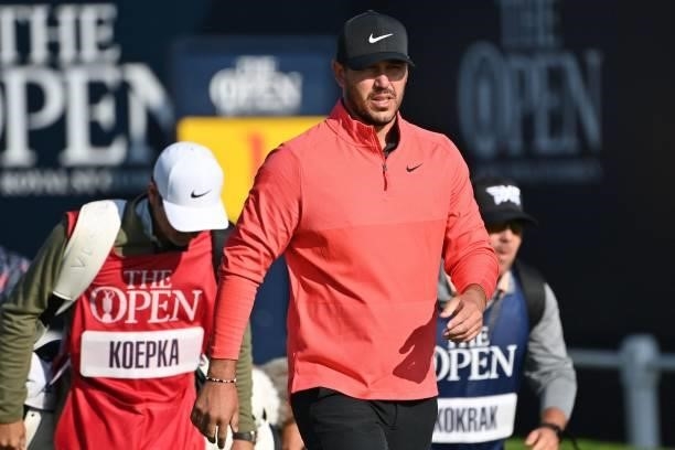 Golfer Brooks Koepka walks from the 1st tee during his first round on day one of The 149th British Open Golf Championship at Royal St George's,...