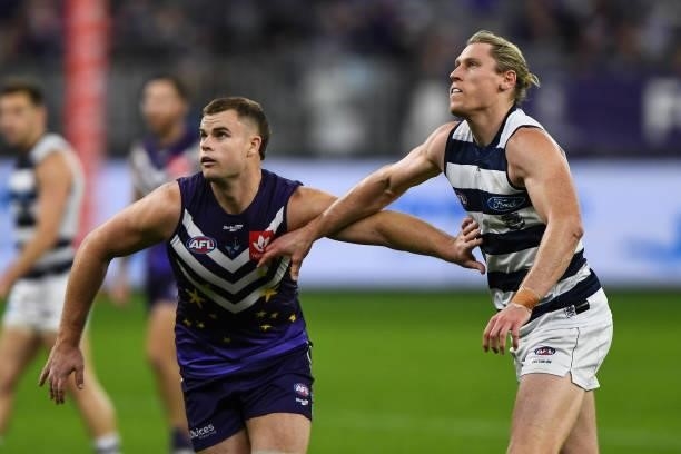 Sean Darcy of the Dockers competes a throw-in with Rhys Stanley of the Cats during the 2021 AFL Round 18 match between the Fremantle Dockers and the...