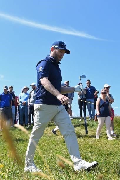 South Africa's Branden Grace leaves the 7th tee during his first round on day one of The 149th British Open Golf Championship at Royal St George's,...