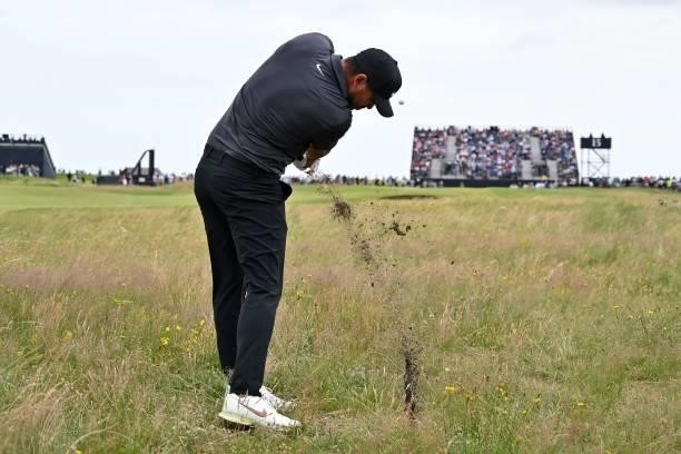 Golfer Brooks Koepka plays from the rough on the 15th hole during his first round on day one of The 149th British Open Golf Championship at Royal St...