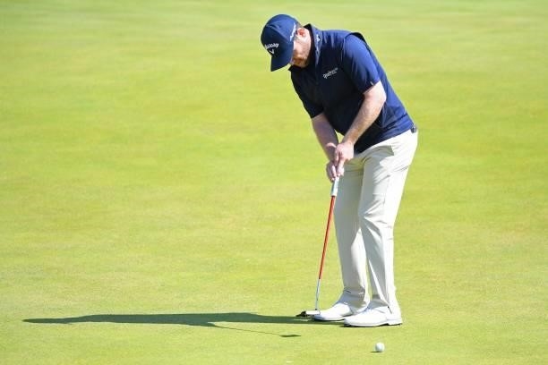 South Africa's Branden Grace putts on the 6th green during his first round on day one of The 149th British Open Golf Championship at Royal St...