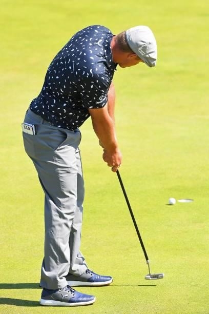 Golfer Bryson DeChambeau misses a putt on the 6th green during his first round on day one of The 149th British Open Golf Championship at Royal St...