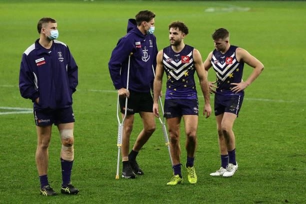 Injured players Sean Darcy and Rory Lobb of the Dockers look on after teams loss during the 2021 AFL Round 18 match between the Fremantle Dockers and...