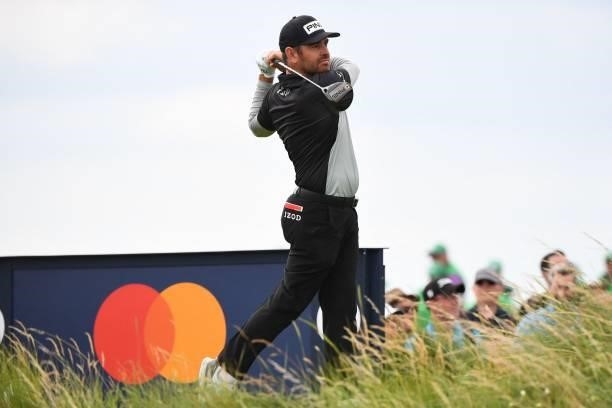 South Africa's Louis Oosthuizen watches his drive from the 9th tee during his first round on day one of The 149th British Open Golf Championship at...