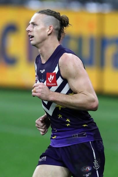 Nat Fyfe of the Dockers looks on during the 2021 AFL Round 18 match between the Fremantle Dockers and the Geelong Cats at Optus Stadium on July 15,...