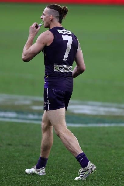 Nat Fyfe of the Dockers looks on during the 2021 AFL Round 18 match between the Fremantle Dockers and the Geelong Cats at Optus Stadium on July 15,...
