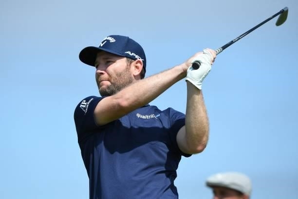 South Africa's Branden Grace watches his iron shot from the 8th tee during his first round on day one of The 149th British Open Golf Championship at...