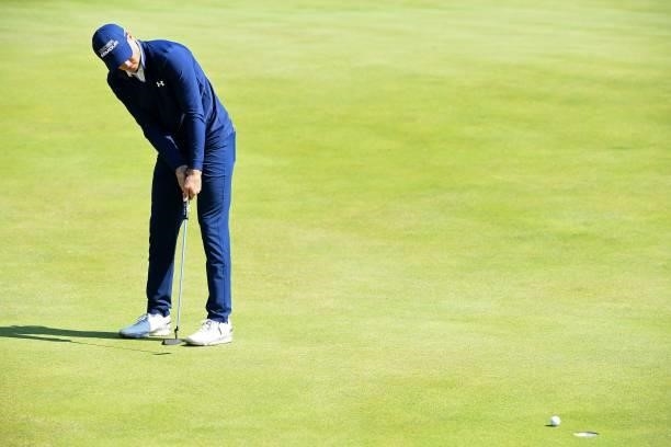 Golfer Jordan Spieth makes his birdie putt on the 6th green during his first round on day one of The 149th British Open Golf Championship at Royal St...