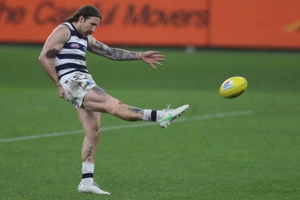 Zach Tuohy of the Cats kicks on goal during the 2021 AFL Round 18 match between the Fremantle Dockers and the Geelong Cats at Optus Stadium on July...