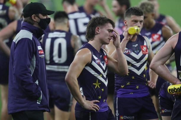Caleb Serong of the Dockers looks on at three quarter time break during the 2021 AFL Round 18 match between the Fremantle Dockers and the Geelong...