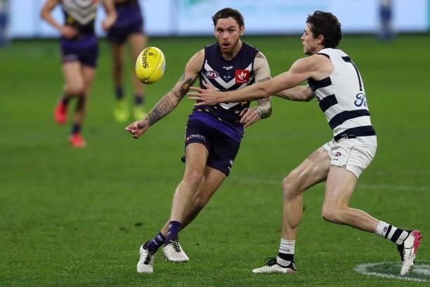 Nathan Wilson of the Dockers kicks the ball during the 2021 AFL Round 18 match between the Fremantle Dockers and the Geelong Cats at Optus Stadium on...