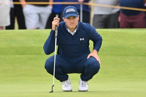 Golfer Jordan Spieth lines up a putt on the 15th green during his first round on day one of The 149th British Open Golf Championship at Royal St...