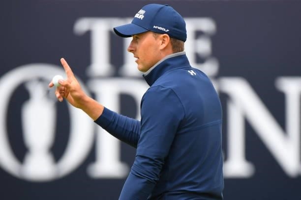 Golfer Jordan Spieth reacts after putting on the 18th green after his first round on day one of The 149th British Open Golf Championship at Royal St...