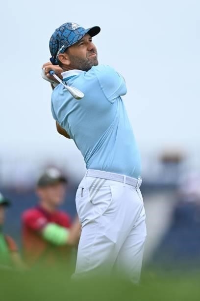 Spain's Sergio Garcia watches his iron shot from the 16th tee during his first round on day one of The 149th British Open Golf Championship at Royal...