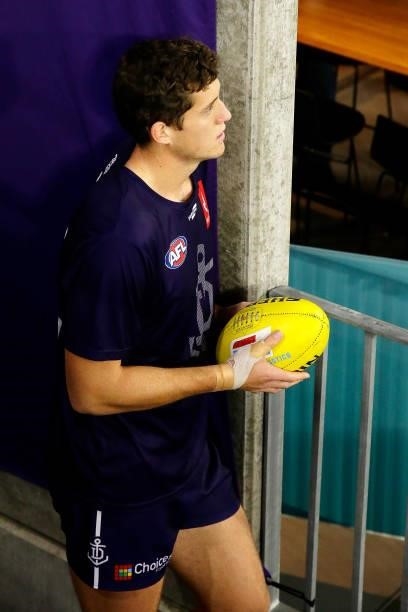 Lloyd Meek of the Dockers looks on before the 2021 AFL Round 18 match between the Fremantle Dockers and the Geelong Cats at Optus Stadium on July 15,...