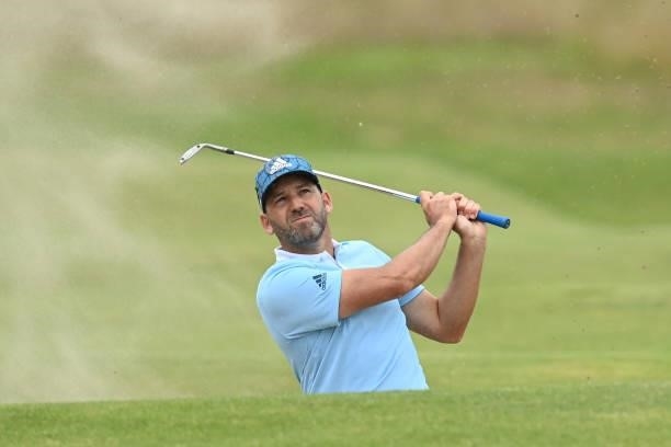 Spain's Sergio Garcia plays from a bunker on the 15th hole during his first round on day one of The 149th British Open Golf Championship at Royal St...