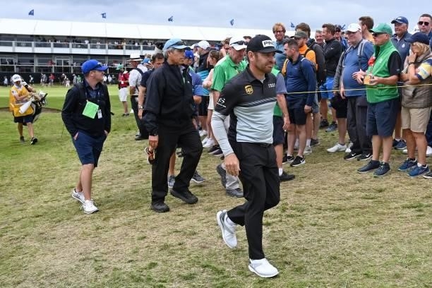 South Africa's Louis Oosthuizen walks to the 17th tee during his first round on day one of The 149th British Open Golf Championship at Royal St...