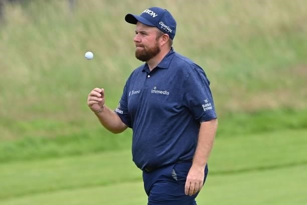 Ireland's Shane Lowry leaves the 18th green after his first round on day one of The 149th British Open Golf Championship at Royal St George's,...