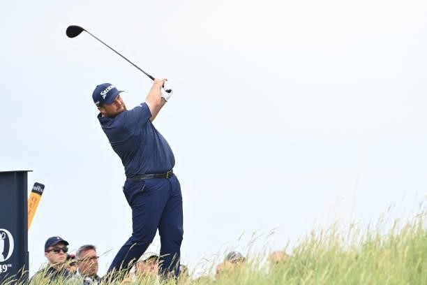 Ireland's Shane Lowry watches his drive from the 18th tee during his first round on day one of The 149th British Open Golf Championship at Royal St...