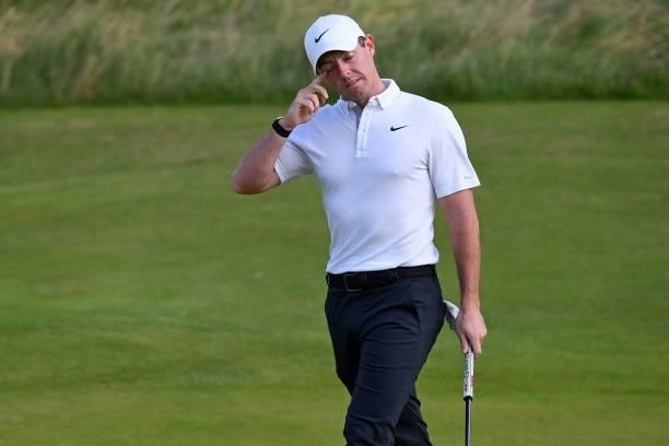 Northern Ireland's Rory McIlroy reacts after missing his par putt on the 6th green during his first round on day one of The 149th British Open Golf...