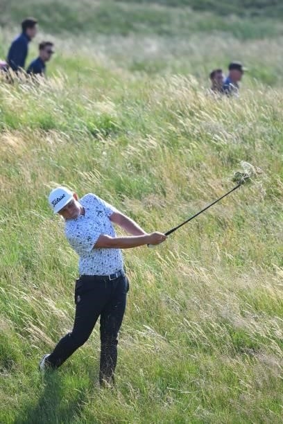 Australia's Cameron Smith plays from the rough on the 7th hole during his first round on day one of The 149th British Open Golf Championship at Royal...