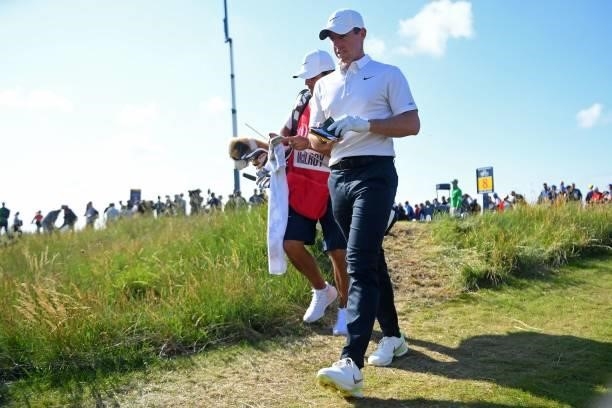 Northern Ireland's Rory McIlroy walks from the 8th tee during his first round on day one of The 149th British Open Golf Championship at Royal St...