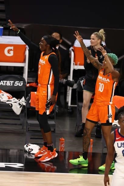Kahleah Copper and Courtney Williams of Team WNBA react to a play against the USA Basketball Womens National Team during the AT&T WNBA All-Star Game...