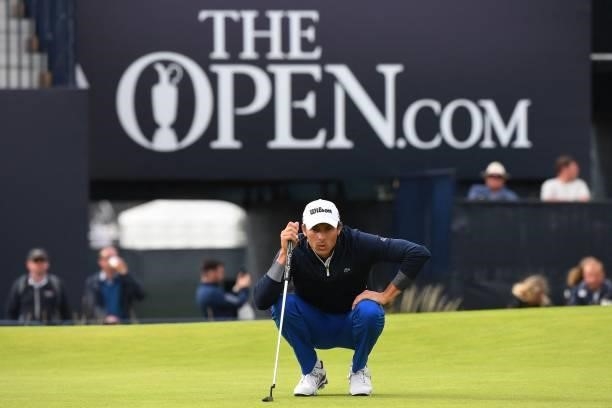 France's Benjamin Hebert lines up a putt on the 18th green during his first round on day one of The 149th British Open Golf Championship at Royal St...