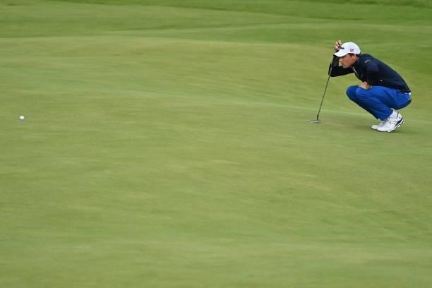 France's Benjamin Hebert lins up a putt on the 18th green during his round of 66 in on day one of The 149th British Open Golf Championship at Royal...