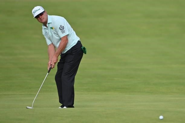 Golfer Charley Hoffman putts on the 18th green during his first round on day one of The 149th British Open Golf Championship at Royal St George's,...