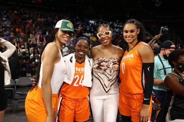 Isabelle Harrison of the Dallas Wings takes a pictures with her teammates, Arike Ogunbowale and Satou Sabally of the Dallas Wings during the AT&T...