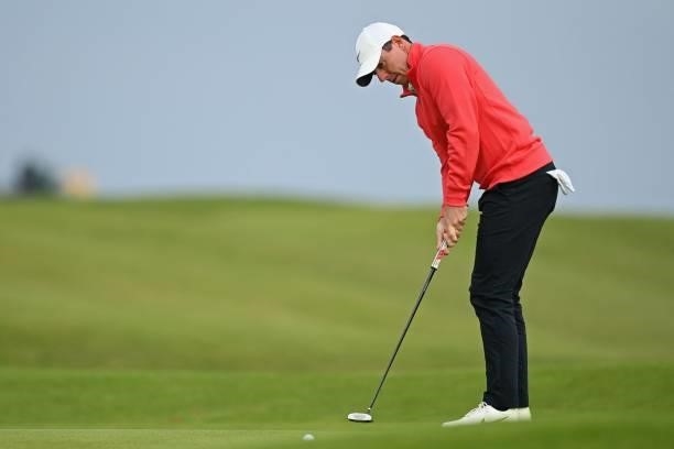 Northern Ireland's Rory McIlroy putts on the 12th green during his first round on day one of The 149th British Open Golf Championship at Royal St...