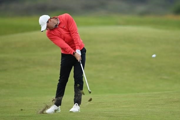 Northern Ireland's Rory McIlroy plays his approach from the 15th fairway during his first round on day one of The 149th British Open Golf...