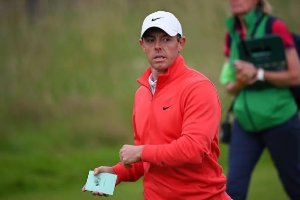 Northern Ireland's Rory McIlroy leaves the 18th green after his first round on day one of The 149th British Open Golf Championship at Royal St...