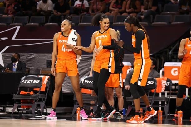 Betnijah Laney, Satou Sabally and Kahleah Copper of Team WNBA react to a play against the USA Basketball Womens National Team during the AT&T WNBA...