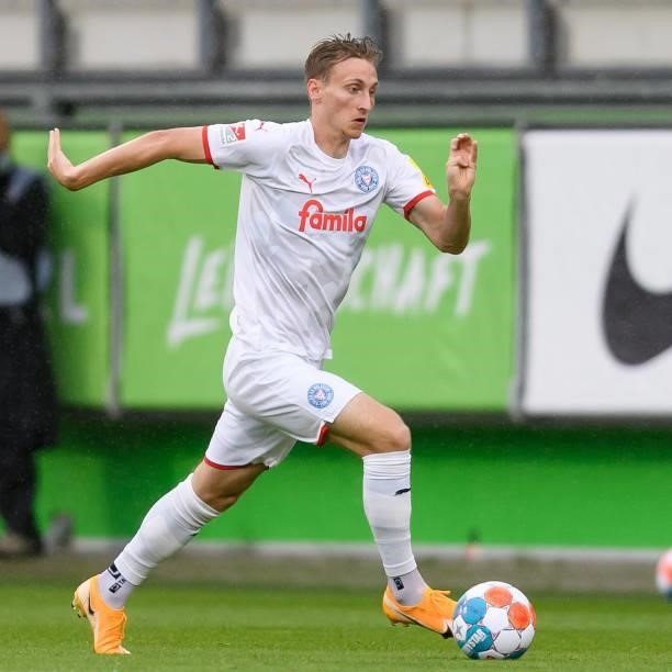 Joshua Mees of Holstein Kiel controls the ball during the Pre-Season Match between VfL Wolfsburg and Holstein Kiel at AOK-Stadion on July 14, 2021 in...