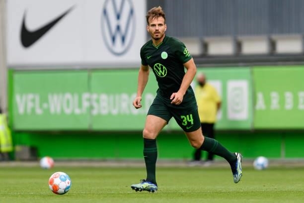 Marin Pongracic of VfL Wolfsburg controls the ball during the Pre-Season Match between VfL Wolfsburg and Holstein Kiel at AOK-Stadion on July 14,...