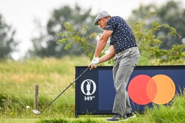 Bryson DeChambeau at impact as he plays his shot from the 14th tee during Day One of the 149th The Open Championship at Royal St. Georges Golf Club...
