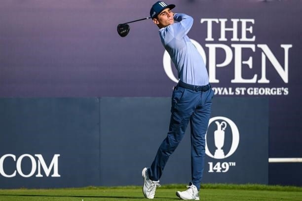 Joaquin Niemann of Chile follows through on his swing as he plays his shot from the first tee during Day One of the 149th The Open Championship at...