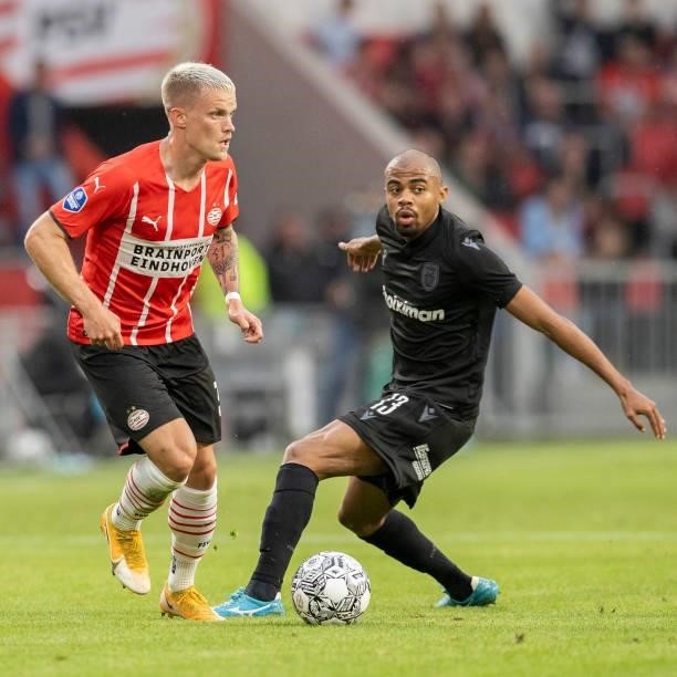 Philipp Max of PSV Eindhoven and Lucas Taylor of PAOK FC battle for the ball during the Pre-Season Friendly match between PSV Eindhoven and PAOK FC...