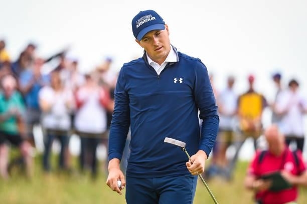 Jordan Spieth reacts to making a par saving putt on the ninth hole green during Day One of the 149th The Open Championship at Royal St. Georges Golf...