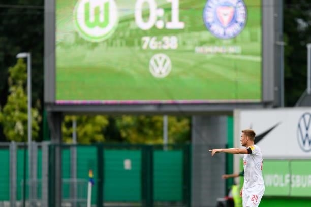 Hauke Wahl of Holstein Kiel gestures during the Pre-Season Match between VfL Wolfsburg and Holstein Kiel at AOK-Stadion on July 14, 2021 in...