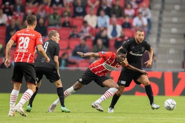 Ibrahim Sangare of PSV Eindhoven and Omar El Kaddouri of PAOK FC battle for the ball during the Pre-Season Friendly match between PSV Eindhoven and...