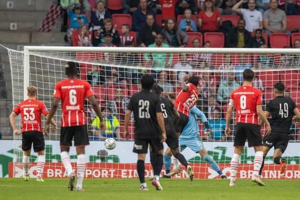 Noni Madueke of PSV Eindhoven scores his team's first goal during the Pre-Season Friendly match between PSV Eindhoven and PAOK FC at Philips Stadion...