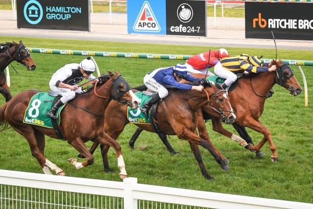 Out To Win ridden by Ben Melham wins the Geelong Print Solutions BM64 Handicap at Geelong Racecourse on July 16, 2021 in Geelong, Australia.